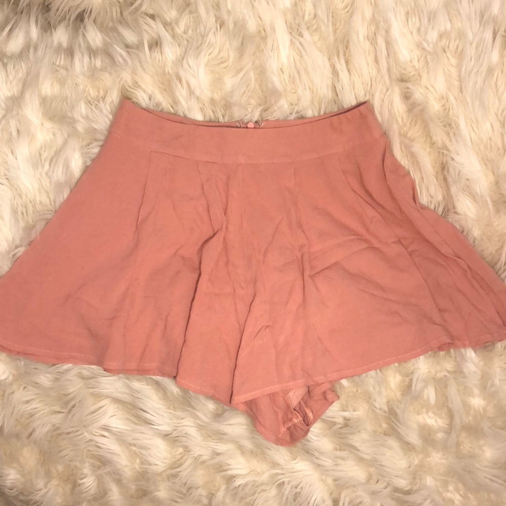 One time used, salmon colored shorts